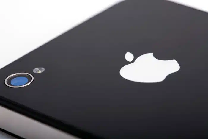 apple logo on the back of an iphone