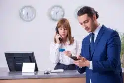  businessman at hotel reception