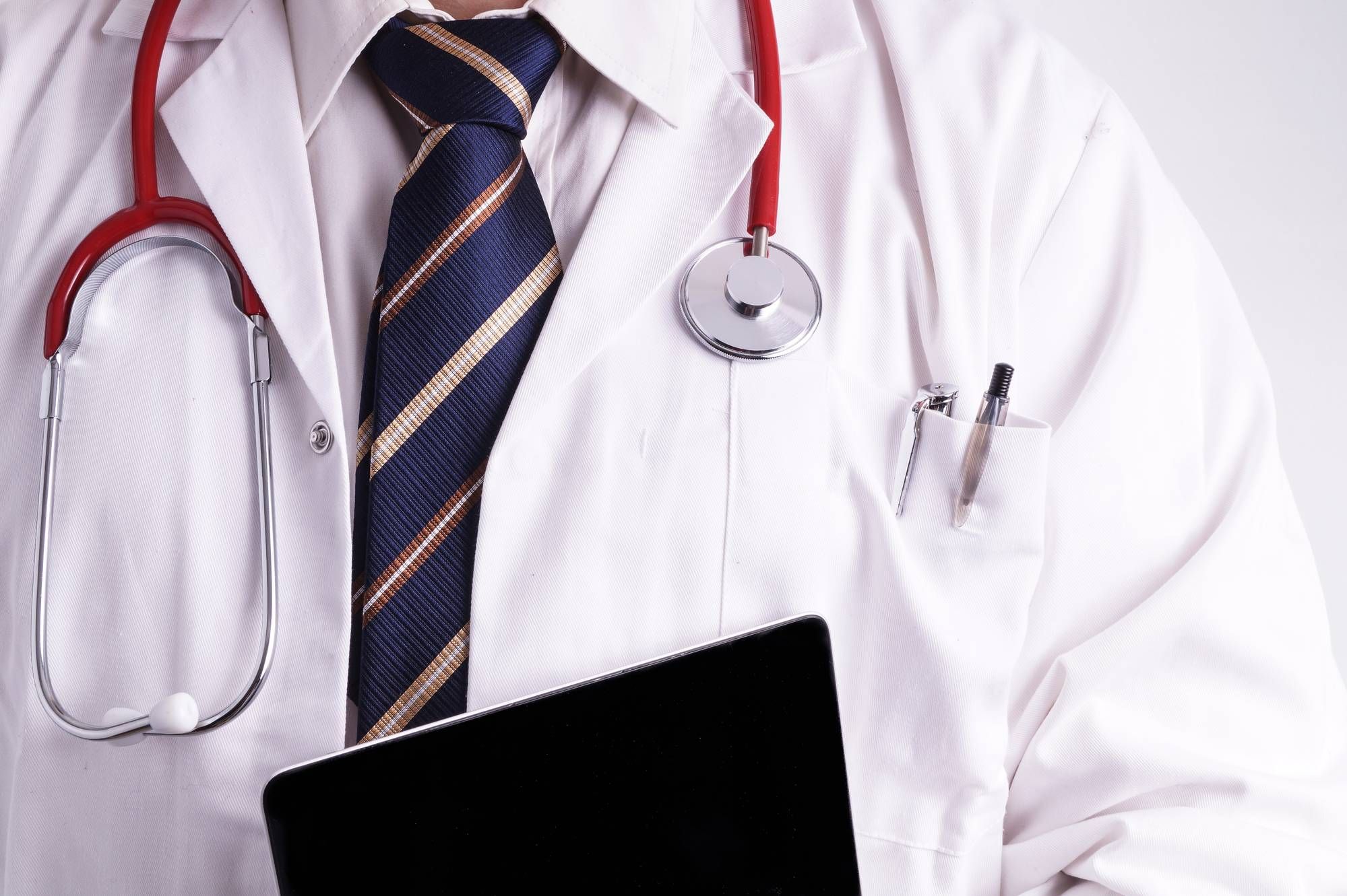doctor with stethoscope and tablet - charleston area medical center