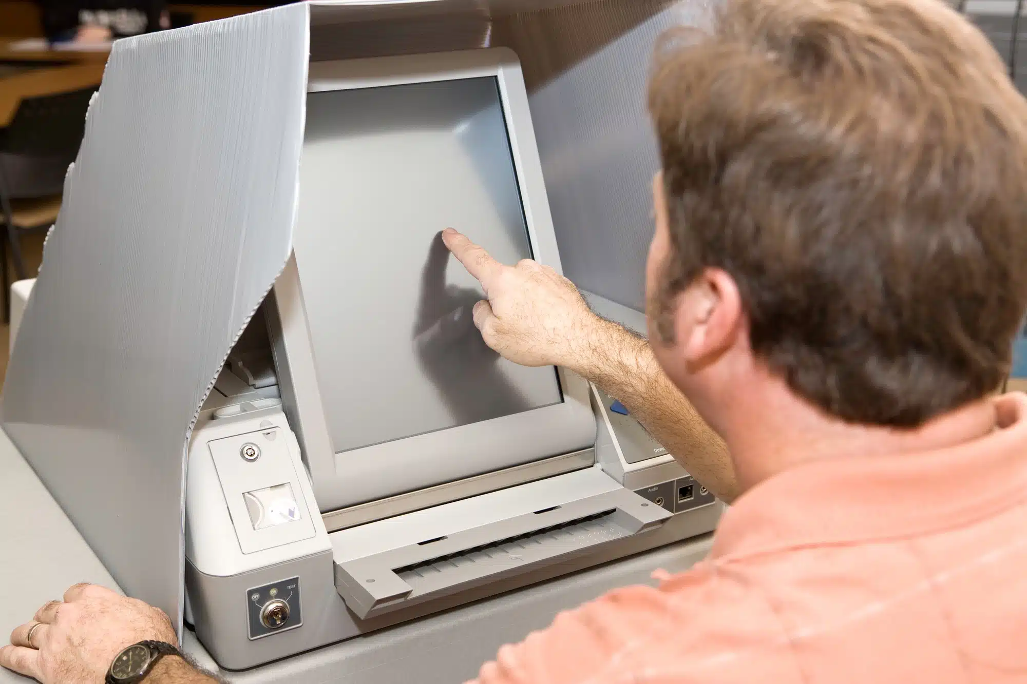 Man using ExpressVote Machine