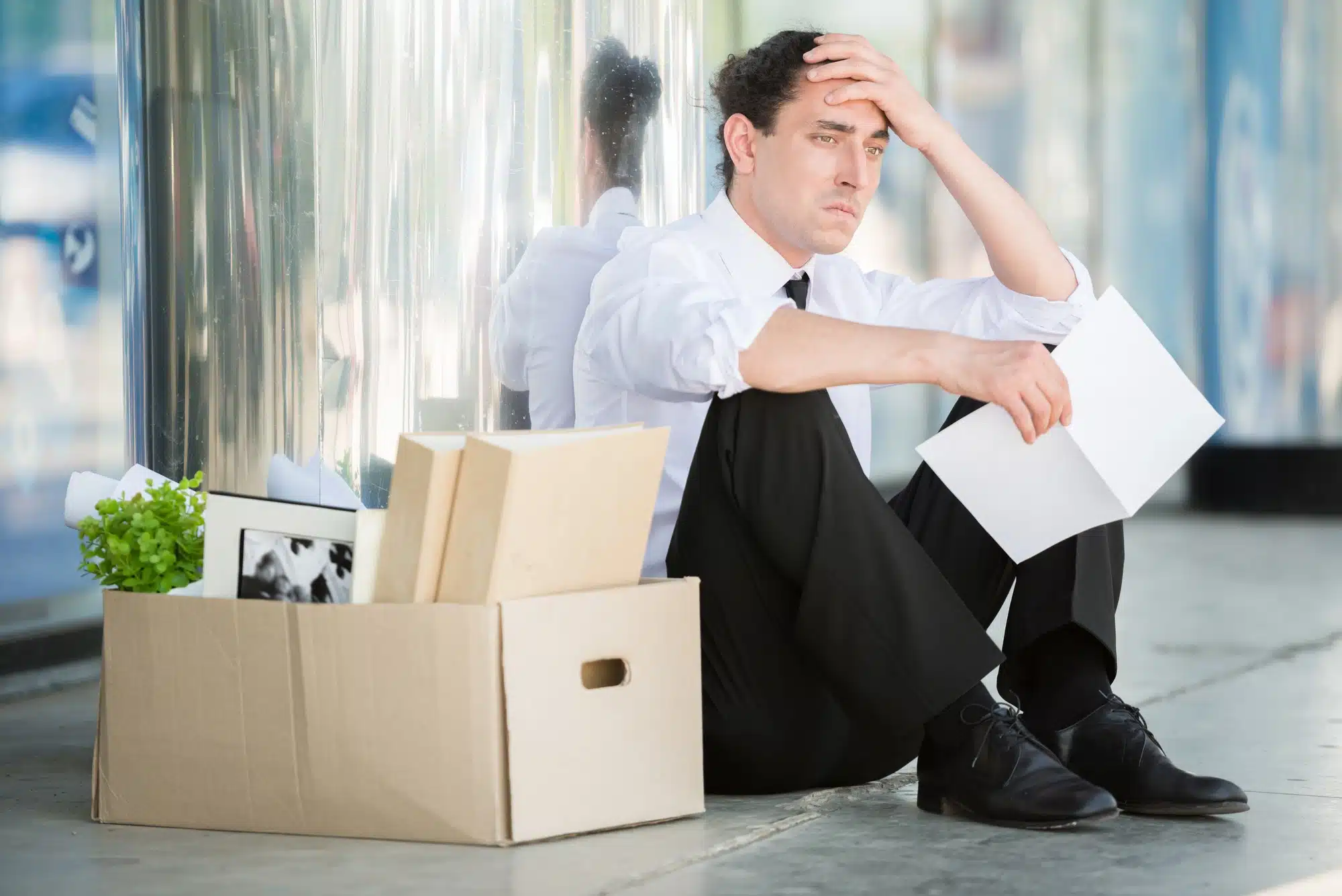 A man worries after being laid off.