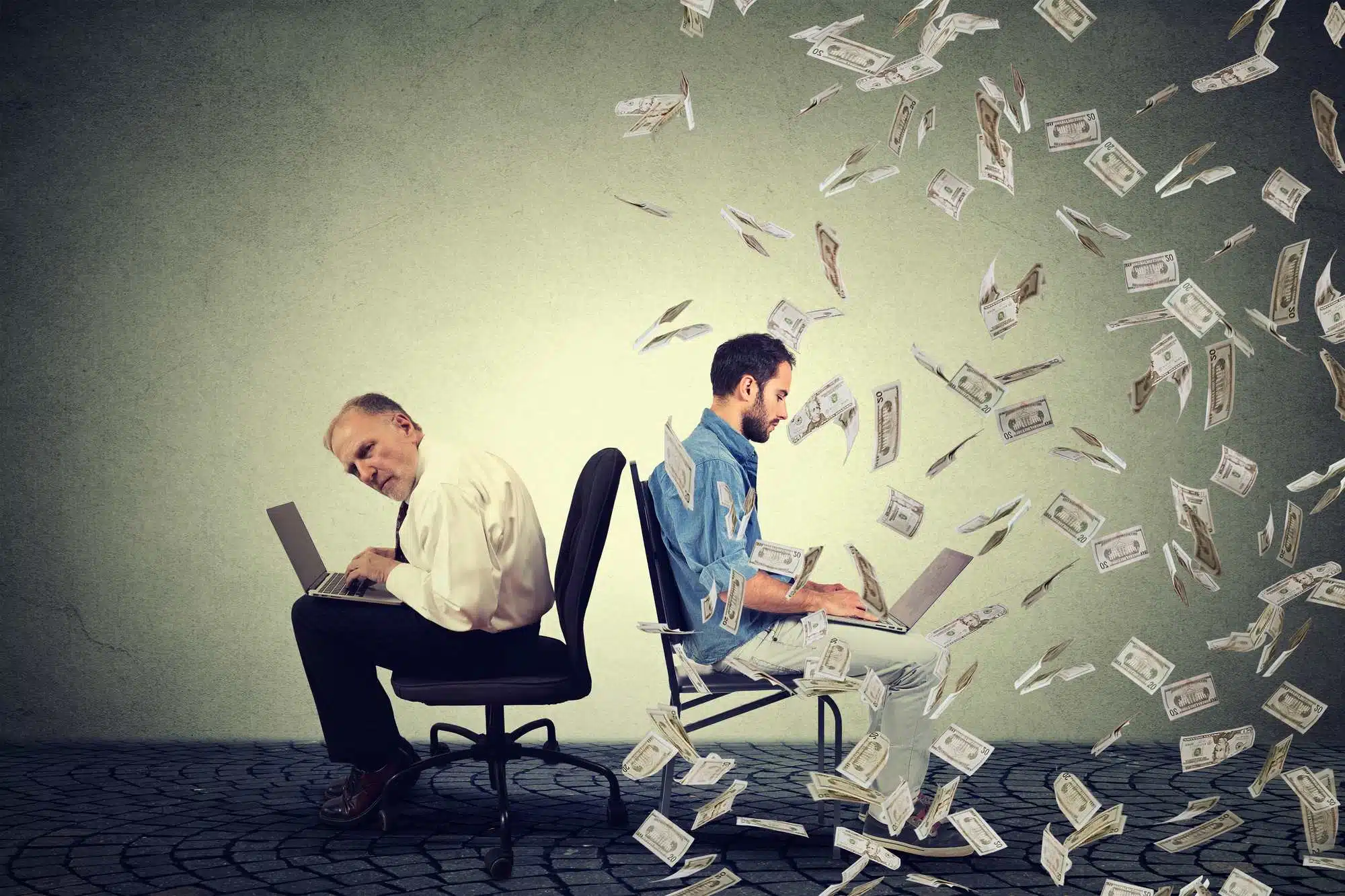 young man being showered with money over older man