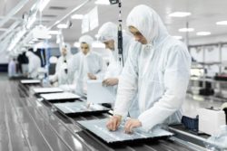 high tech assembly line workers