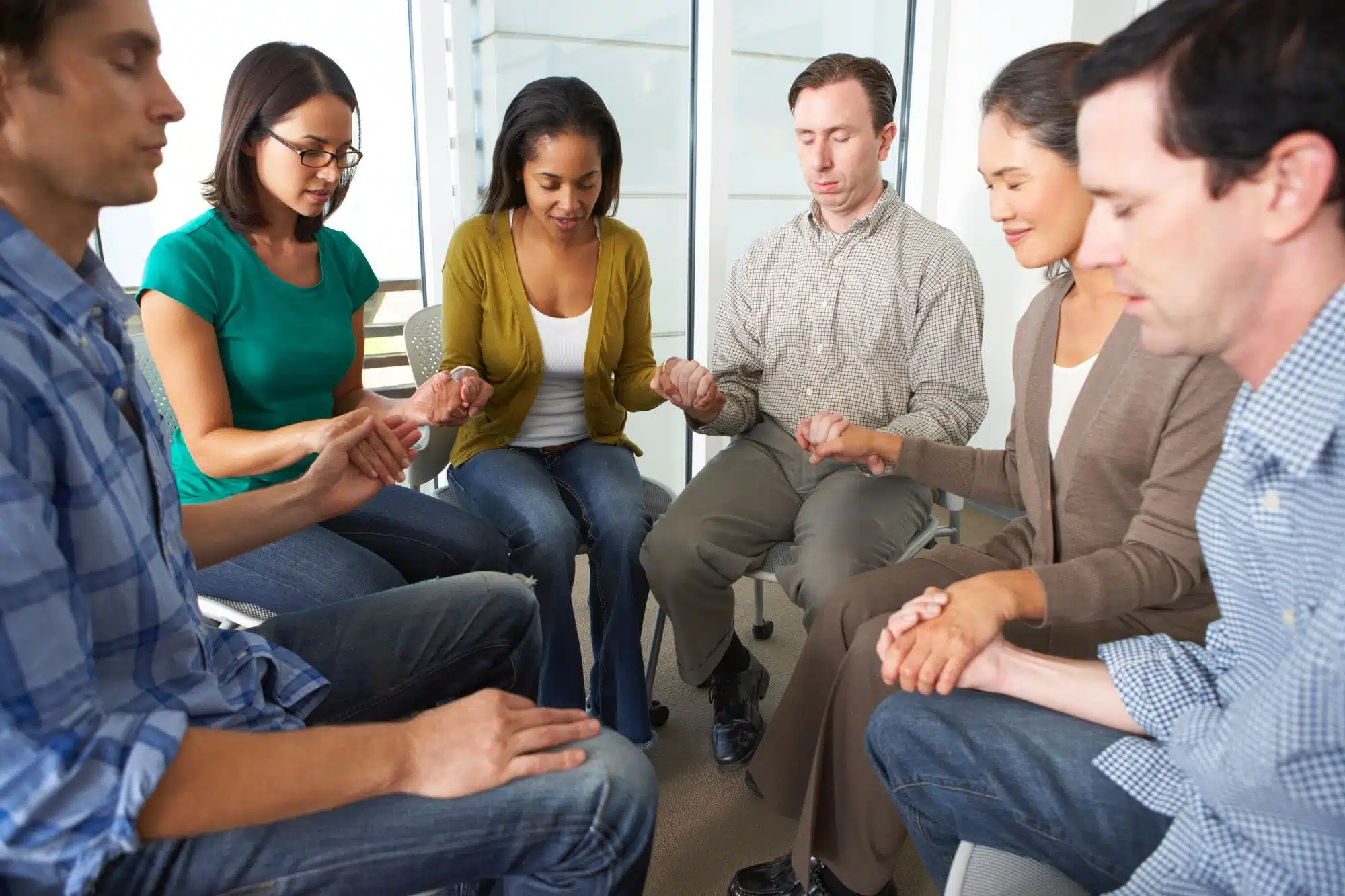 people praying at church