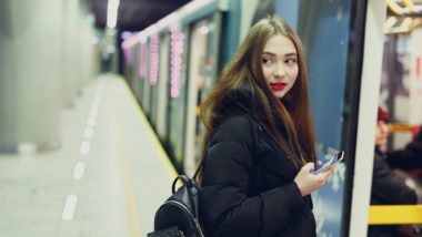 A woman looks over her shoulder.