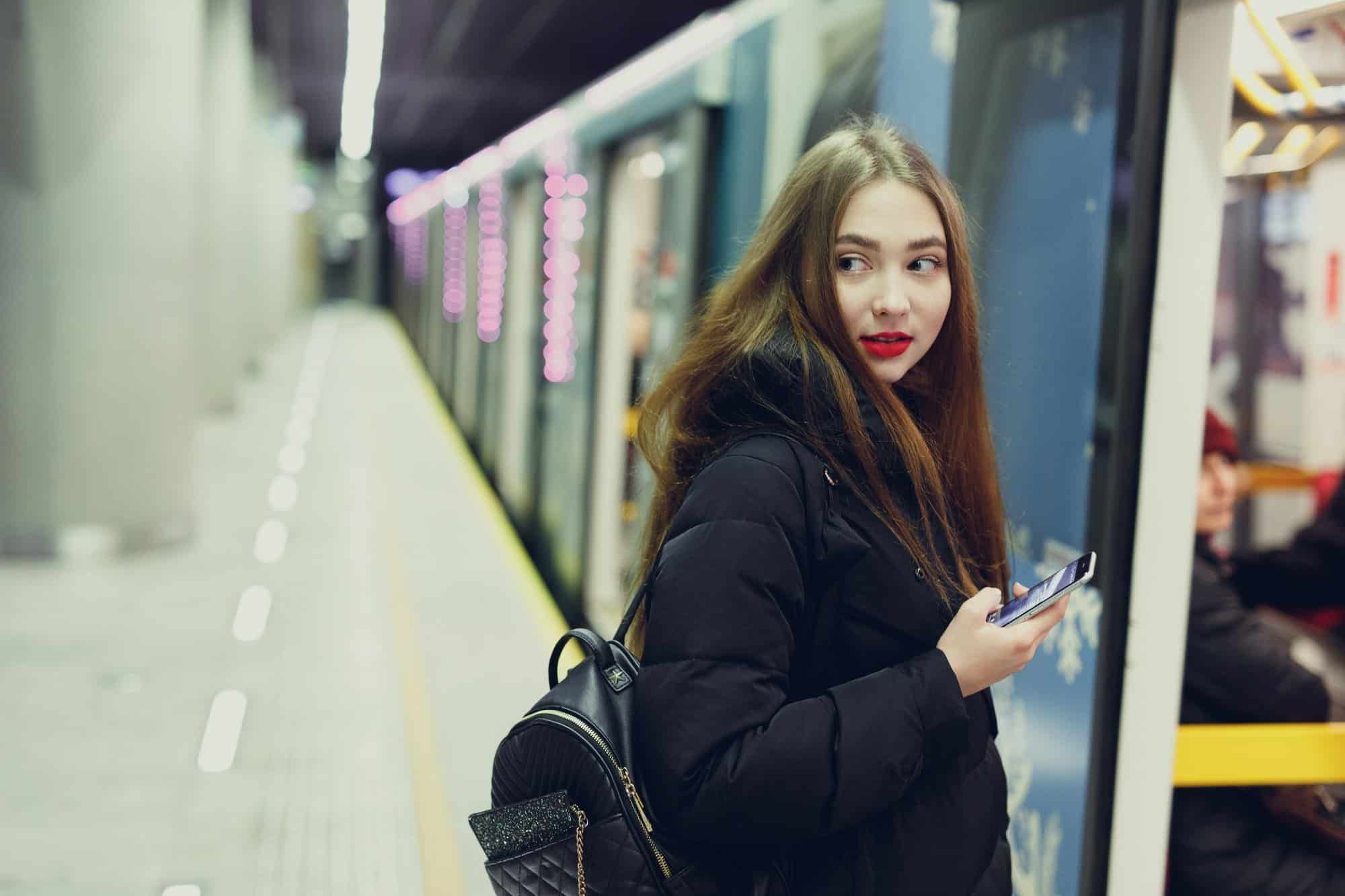 A woman looks over her shoulder.