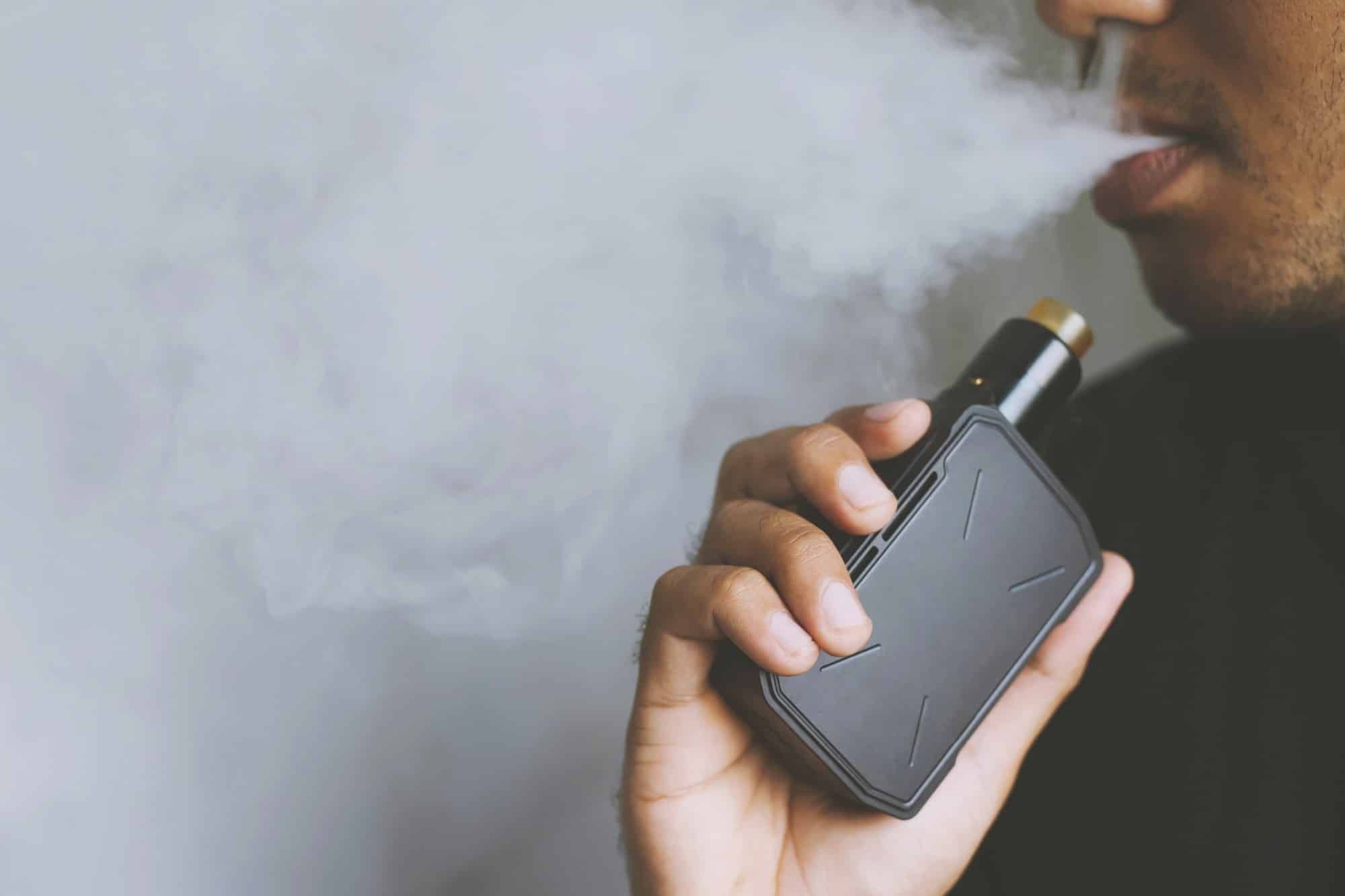 Young man with juul pods
