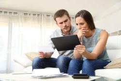 Couple checking Planet Fitness account