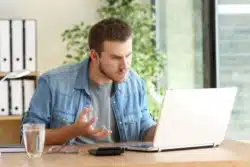 man angry on Hulu laptop browser.