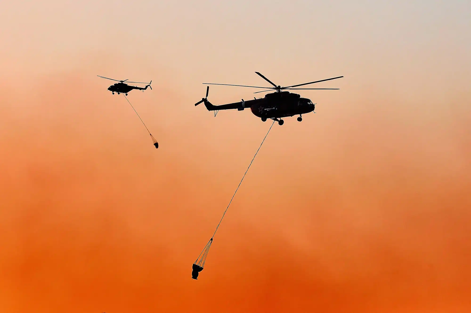 Two helicopters used for firefighting