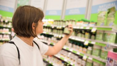 woman buying over the counter drugs