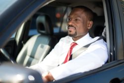 Male driver wears his seat belt