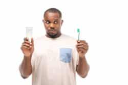 Brushing teeth with Tom's of Maine