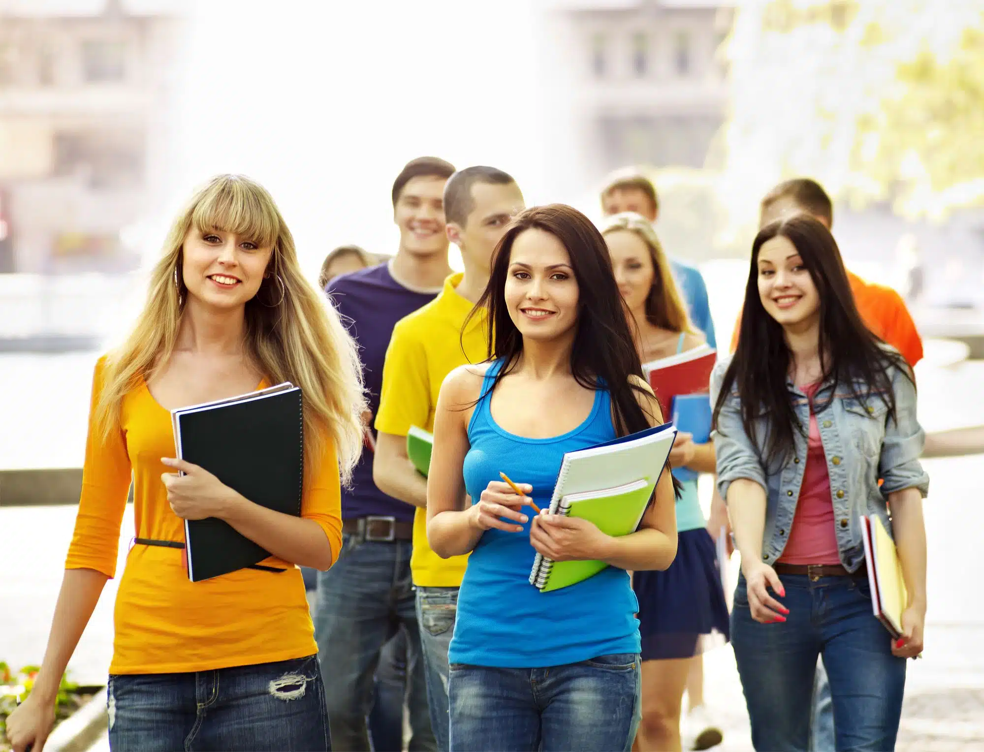 group of students walking to class on campus