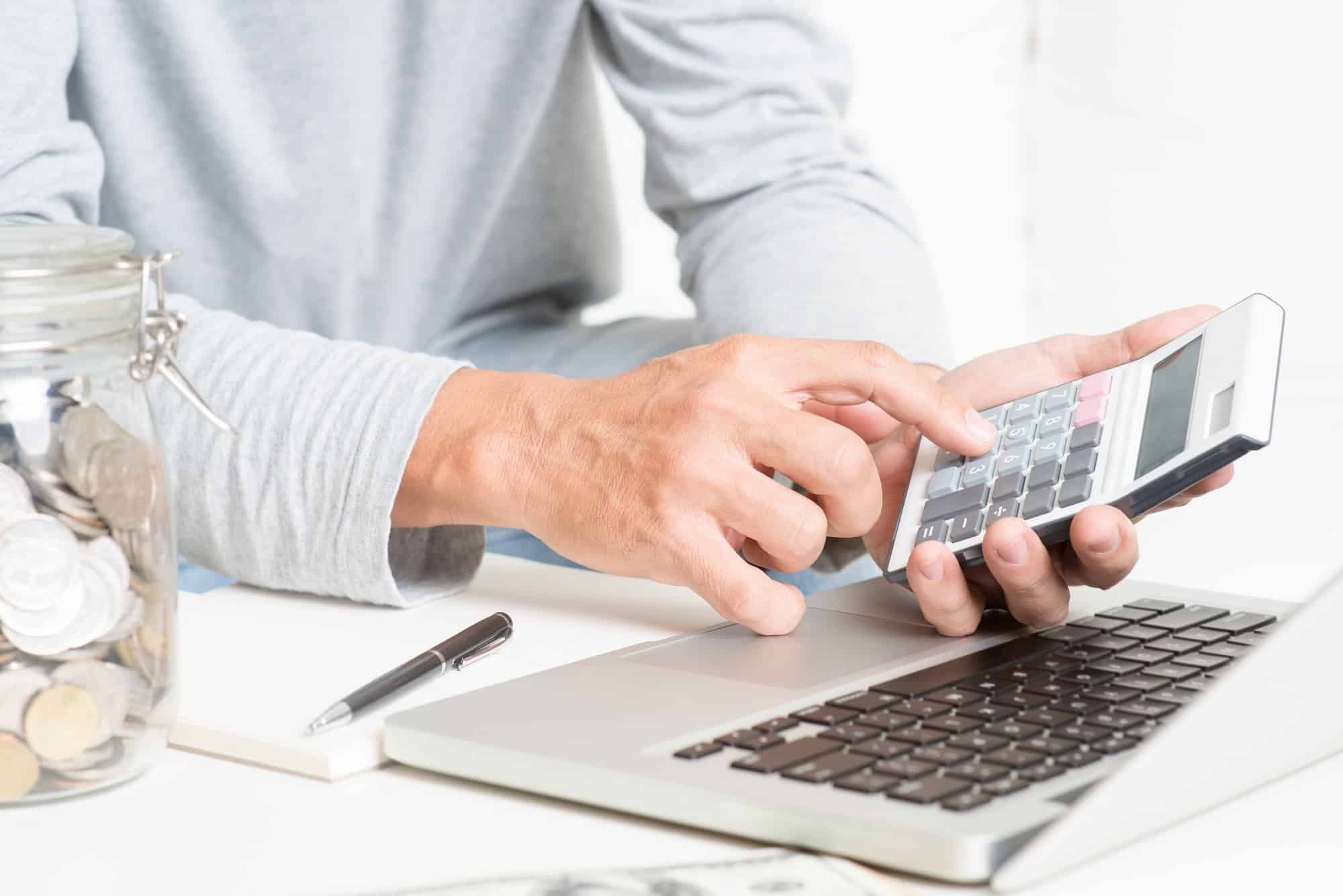 man paying mortgage online