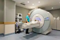 A patient gets a CT scan.