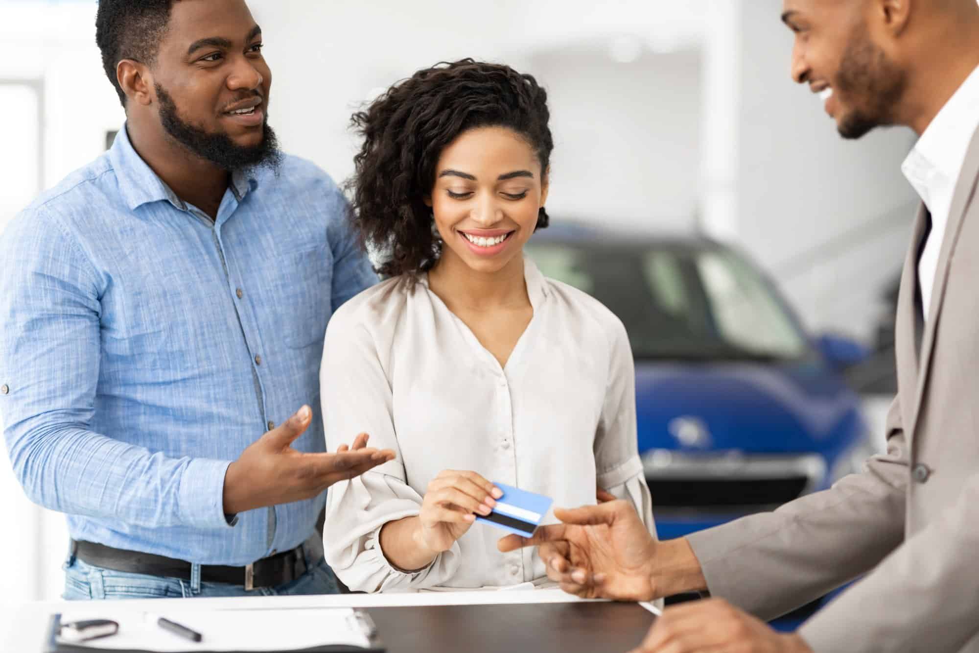 Couple paying with credit card