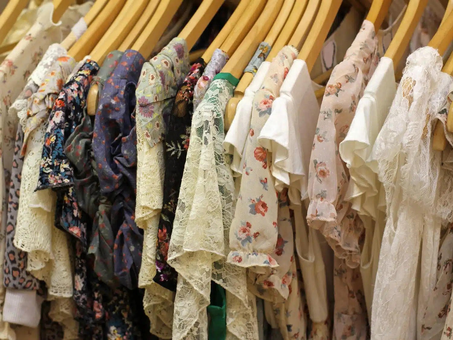 Floral dresses on a rack - Draper James