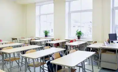 Desks in empty classroom