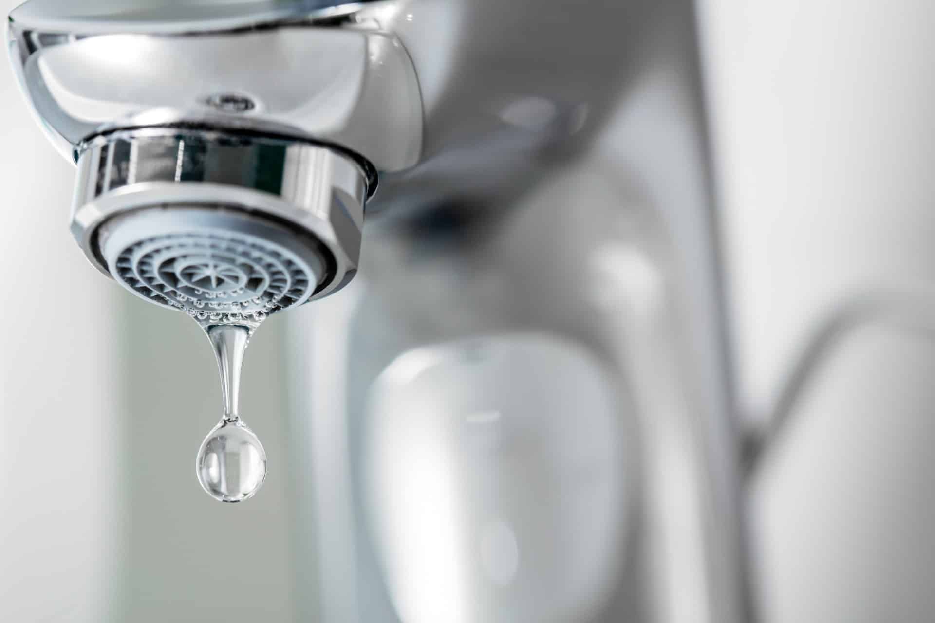 Drip falls from silver faucet - Detroit water