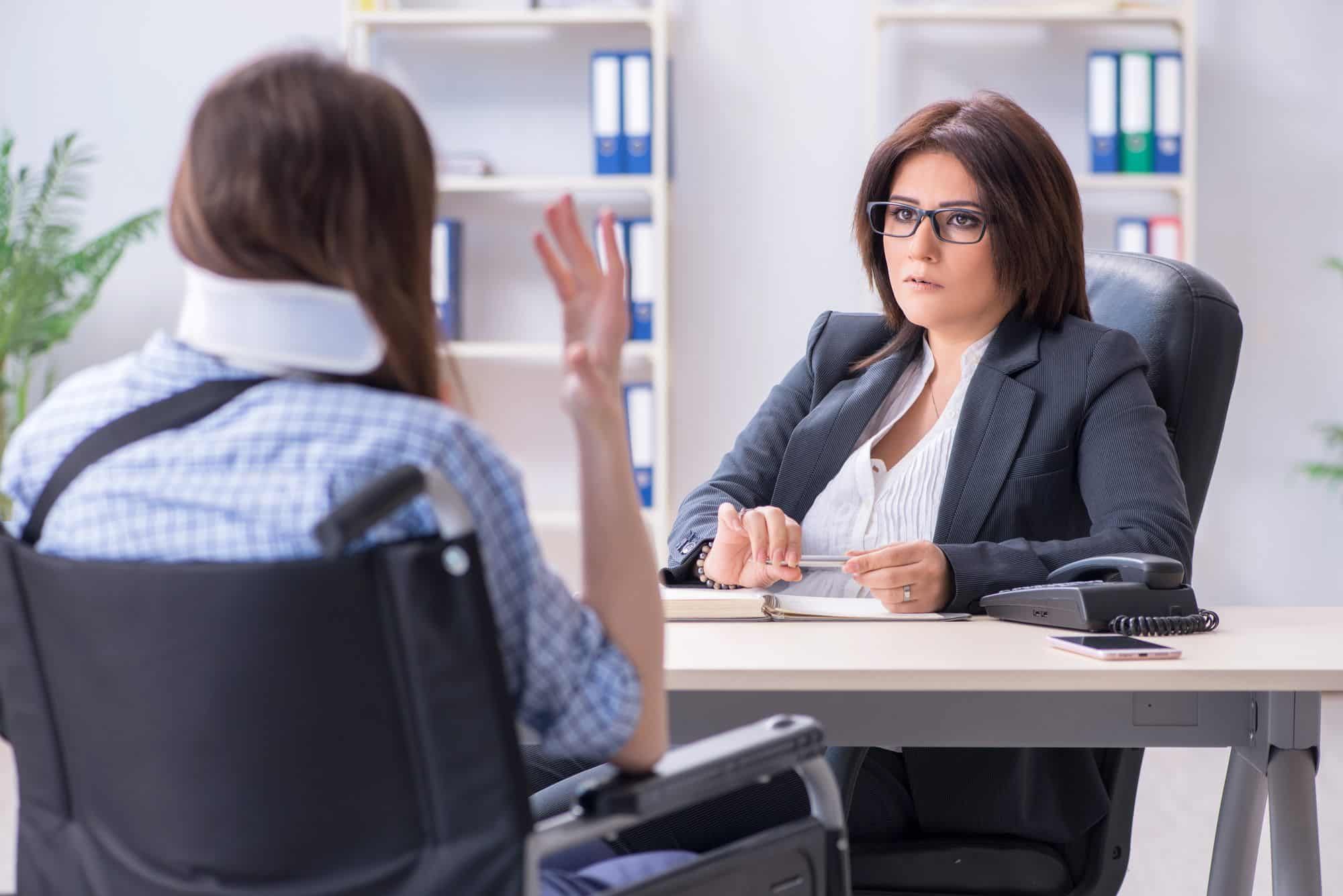 lawyer helping client with disability claim