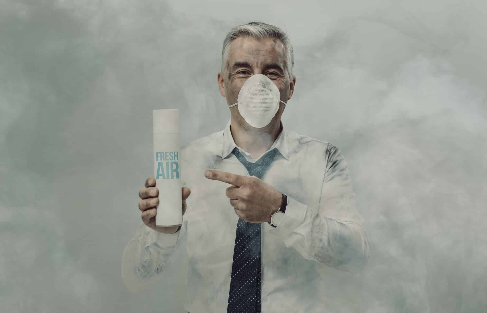 man in face mask selling fresh air
