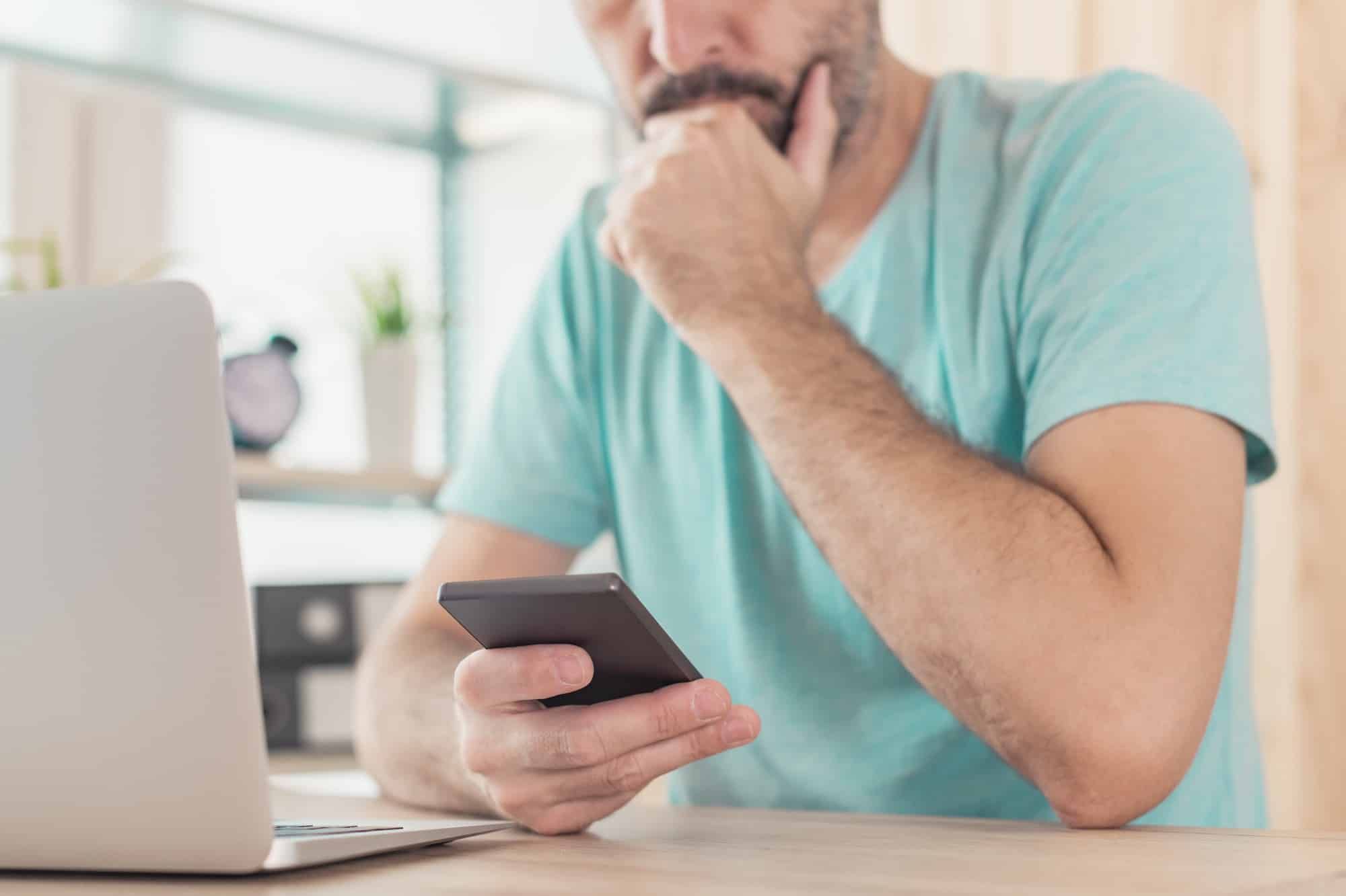 Man reads text from Navy Federal CU TCPA program.