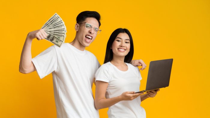 couple holding onto cash from class action rebates