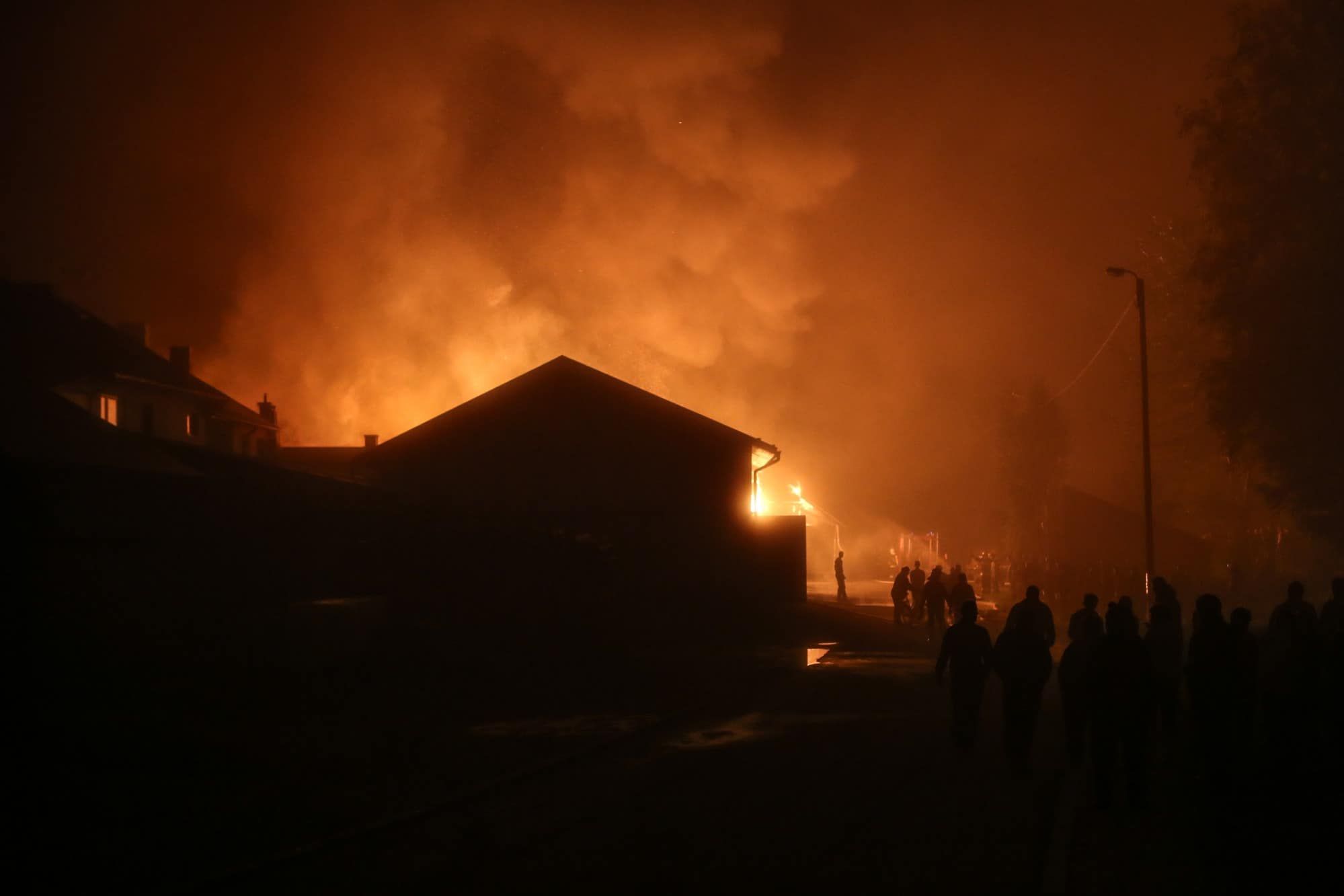 people around a burning building