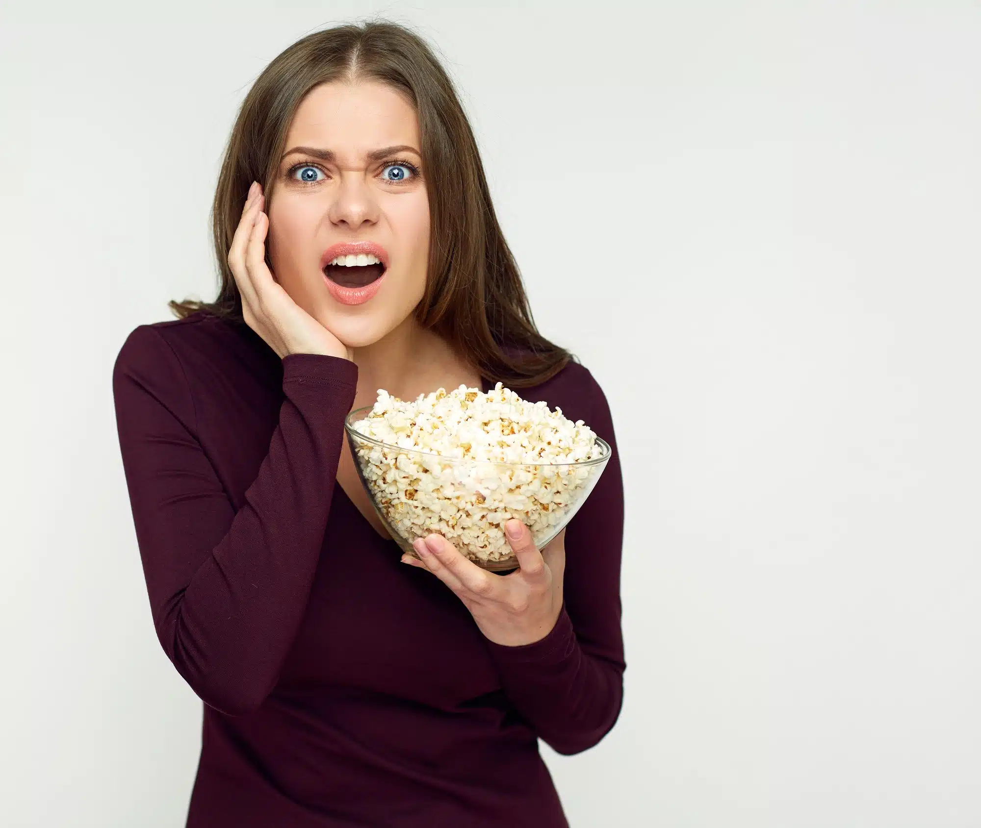 surprised eating Full Circle Market popcorn