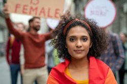 A woman participates in a rally.