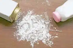 The word DANGER spelled out in talcum powder