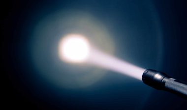Duracell LED flashlight shining in the dark