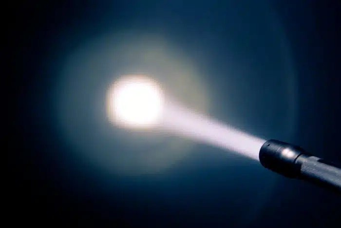 Duracell LED flashlight shining in the dark