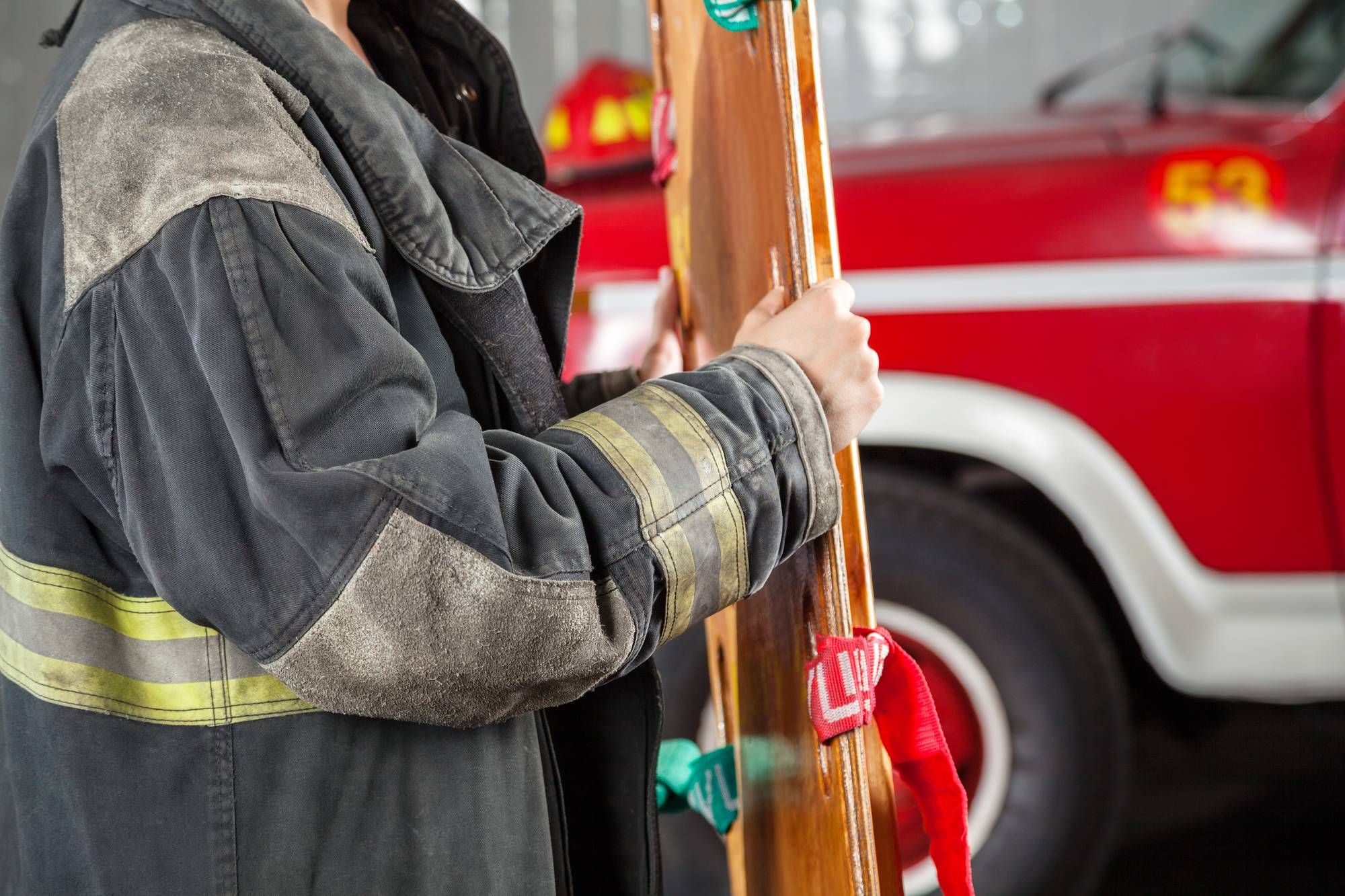 fire fighter with stretcher