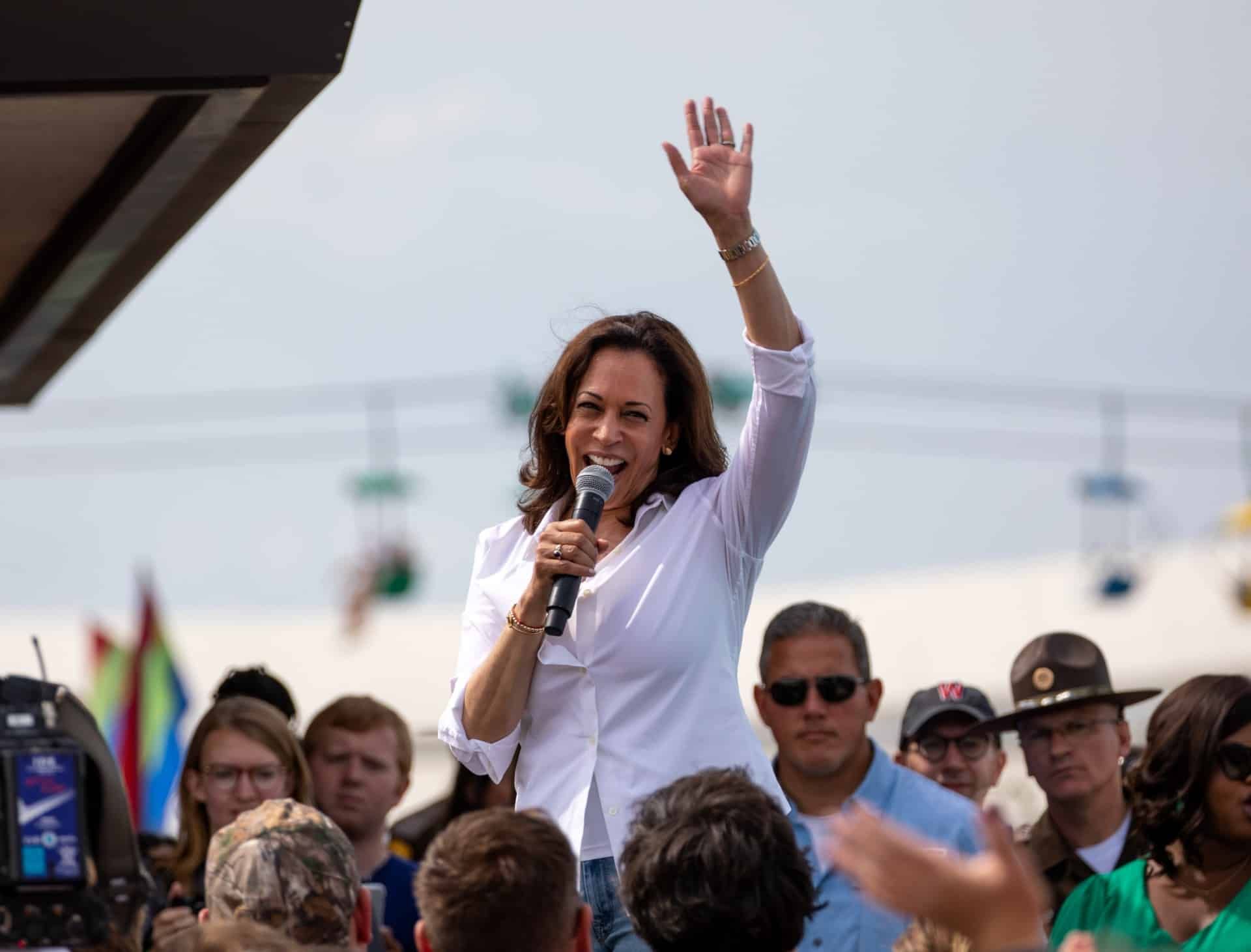 Sen. Kamala Harris speaks and waves to outdoor crowd