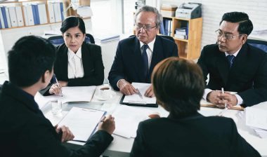 Opposing lawyers discuss settling a case