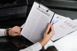 Man reviewing life insurance policy