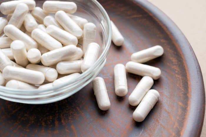 nature's way ginkgo biloba nutrition supplements in a bowl