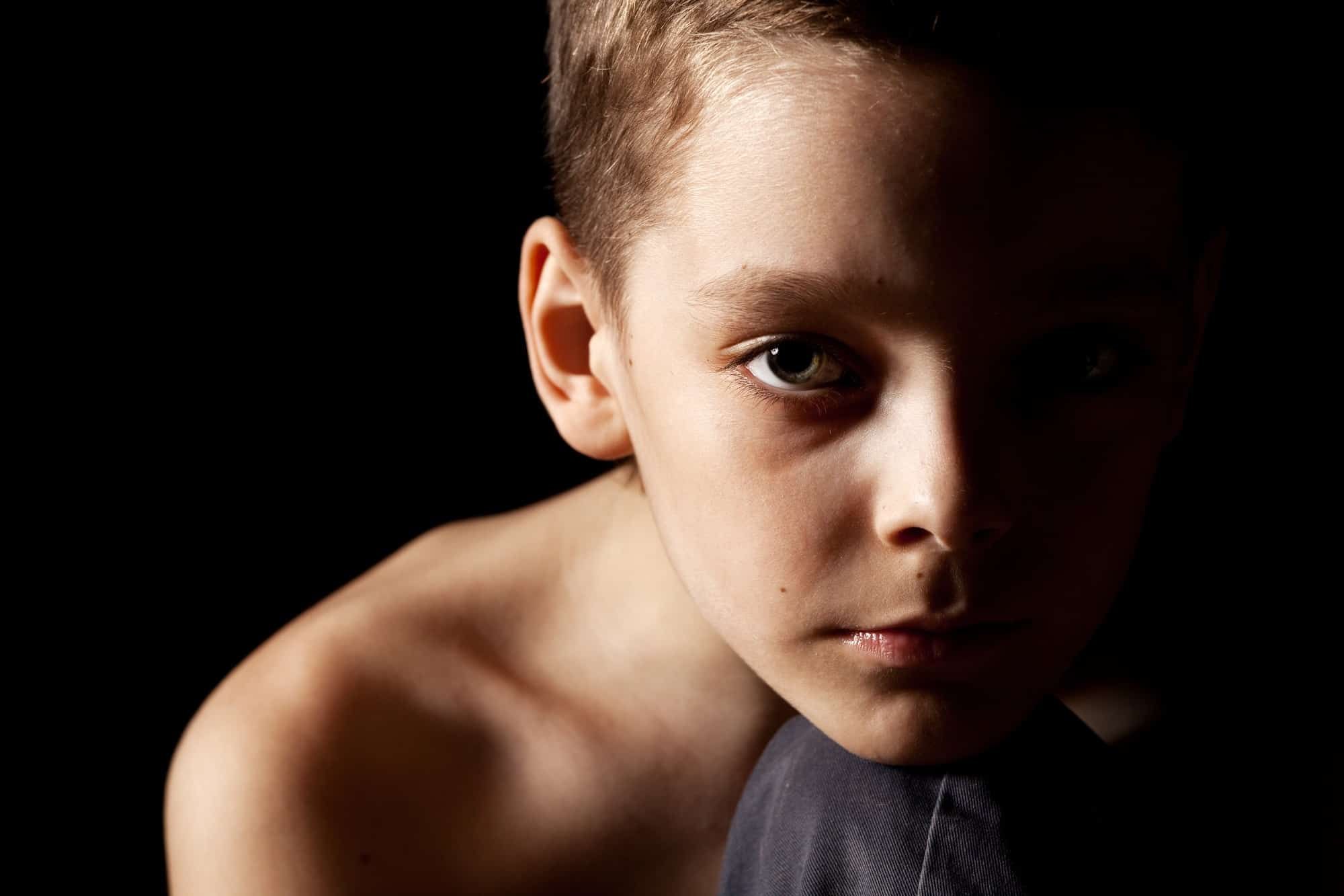 young sad male child