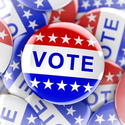 Red-white-and-blue "Vote" buttons - Illinois voters