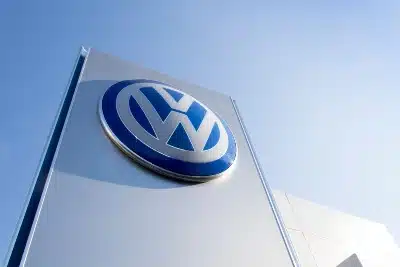 Sign in front of Volkswagen dealership - volkswagen automatic braking system