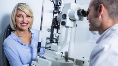 Woman receiving eye exam