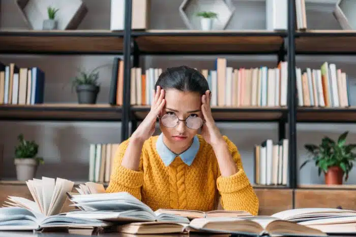 college student frustrated with Nelnet student loan debt