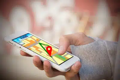 Closeup of person using a GPS app on their smartphone - lyft app