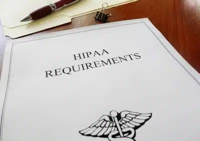 HIPAA requirements paperwork on desk - quest diagnostics test results