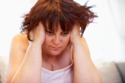 depressed overweight woman