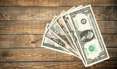 stack of class action rebates money