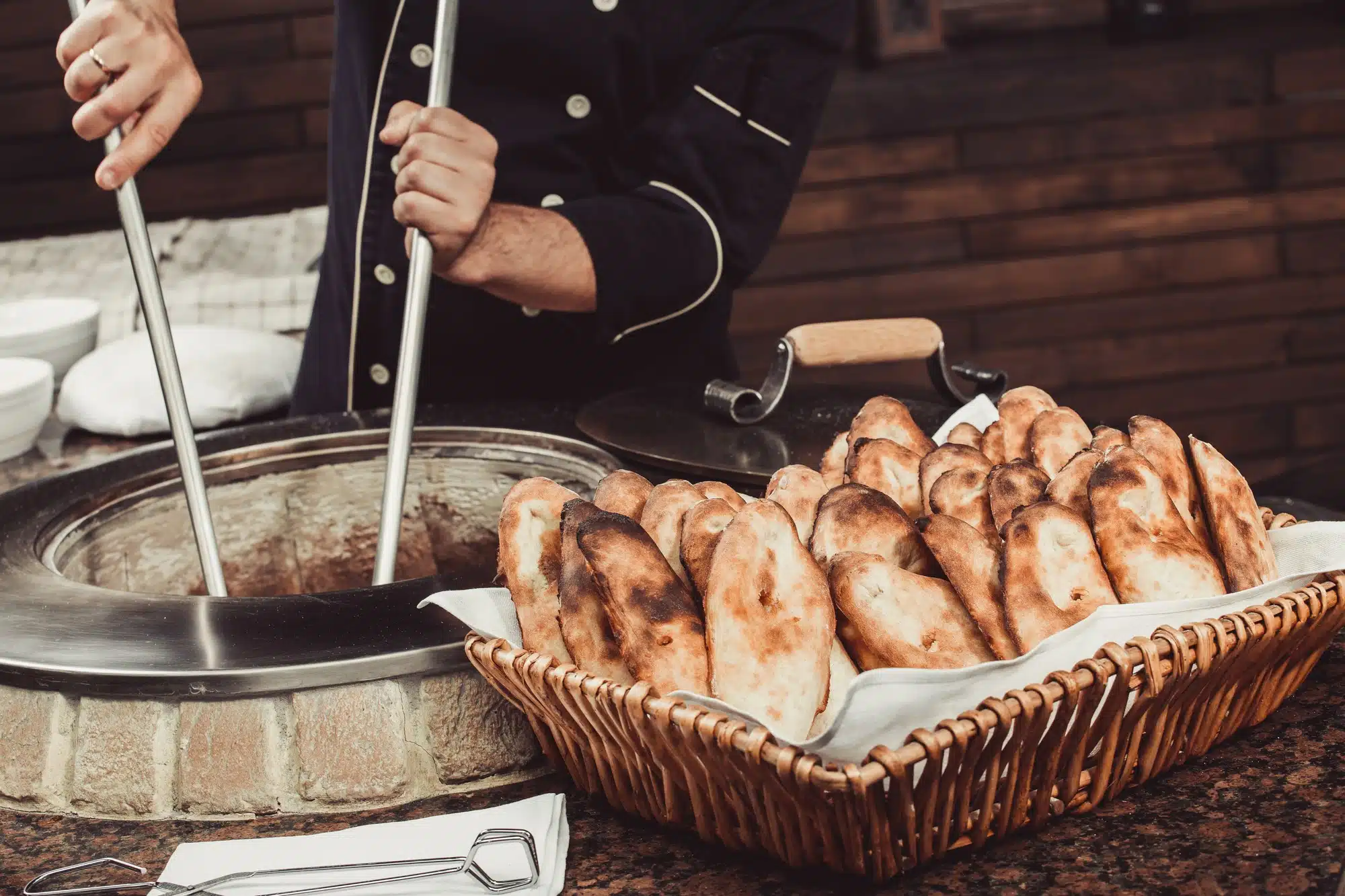 Nann bread is traditionally baked in a tandoor oven.