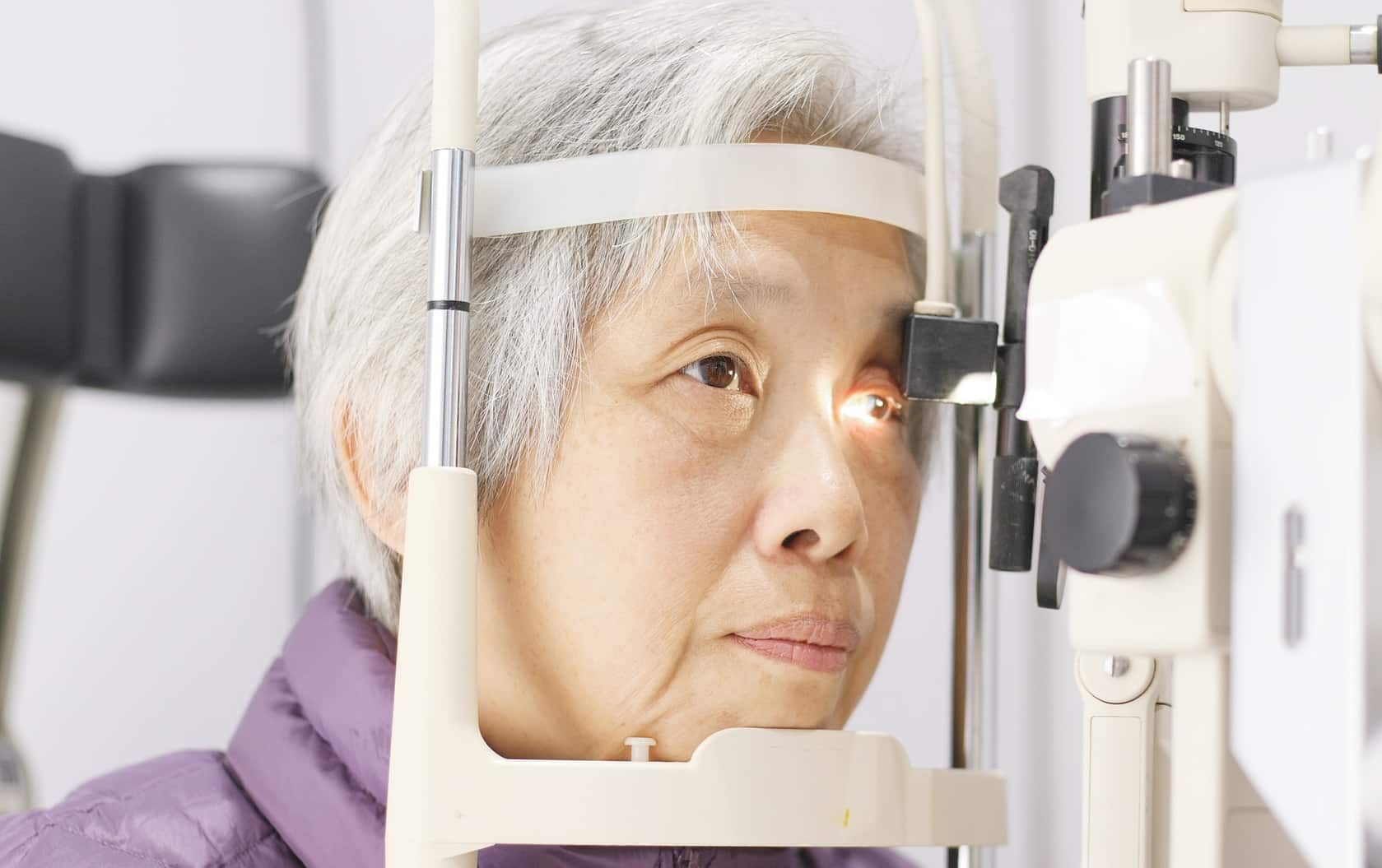 Senior woman has eye exam